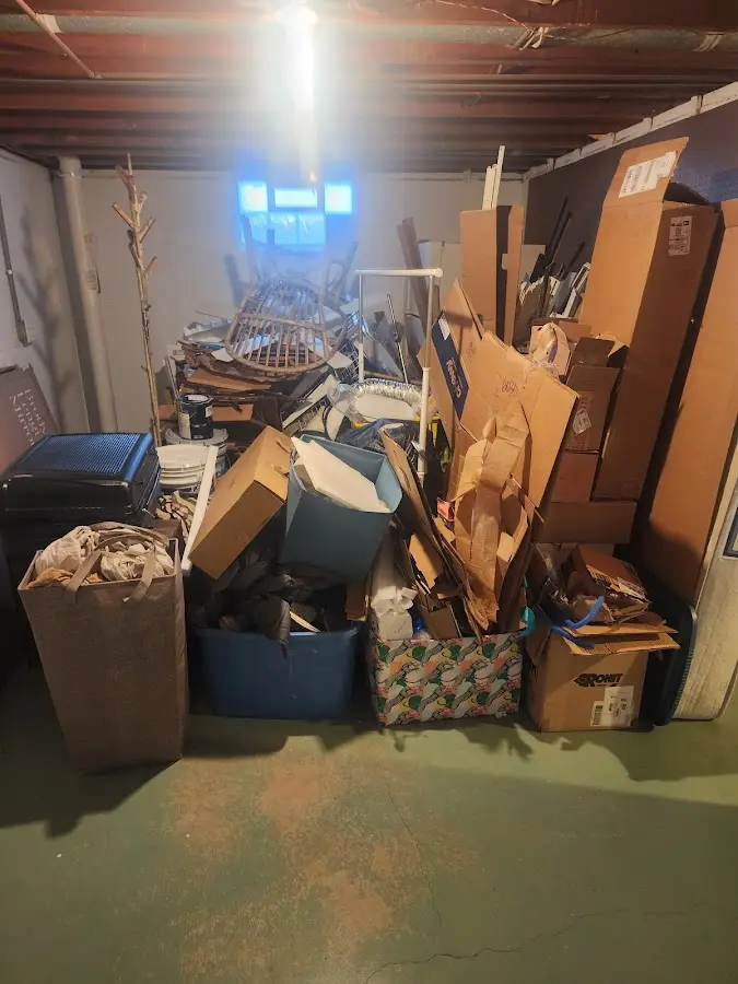 Roll-off dumpster container at job site for 2 Yard Dumpster Rental in Kewaskum